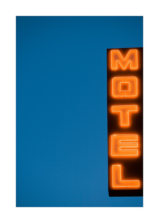  - Photograph of sign with neon lights and text Motel against a dark blue background