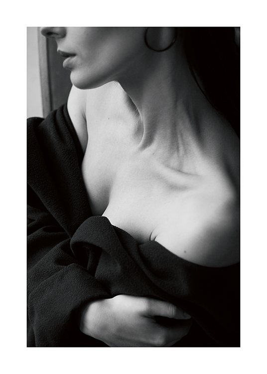  – Black and white photograph of a woman with her neck and shoulders bare