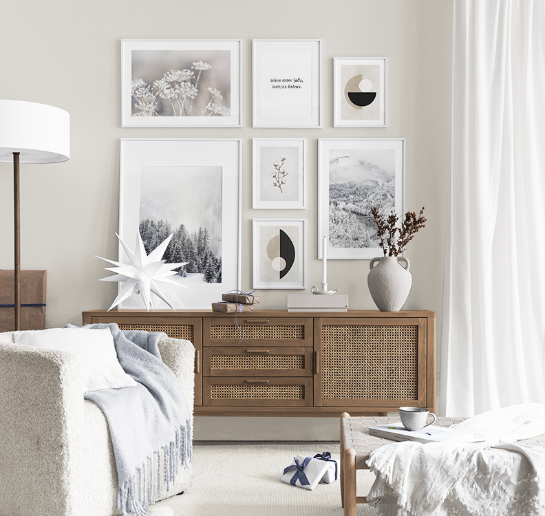 Snowy landscape prints combined with quotes and graphic posters for living room